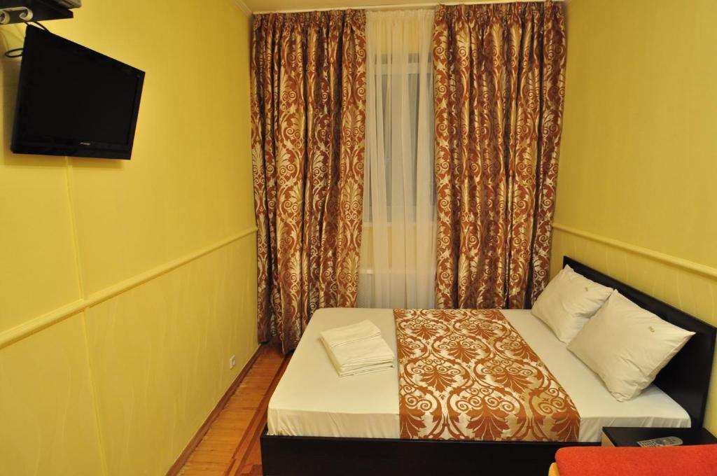 Status Guesthouse Kijev Szoba fotó